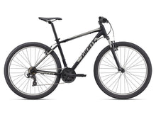 Load image into Gallery viewer, A black Giant brand mountain bike, model ATX 27.5, with aluminum frame and alloy wheels.