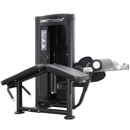 A black FFITTECH prone leg curl machine with stainless steel and aluminum structure, featuring a cushioned area for exercise and a storage compartment.