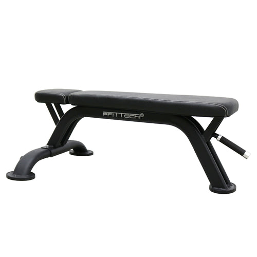 A black FFITTECH flat exercise bench designed for gym use, featuring a padded surface and a metal frame with a handle.