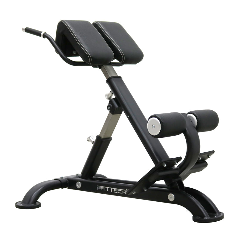 A black FFITTECH lower back bench designed for strength training, showing the adjustable back and seat pads with the company's branding on the side.