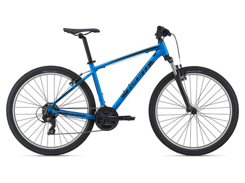 A vibrant blue Giant bicycle with a step-through frame, mounted front and rear derailleurs, and a chain drive.