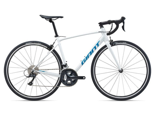 A metallic white road bicycle with black and blue details, including the brand name 'Giant' on the down tube.