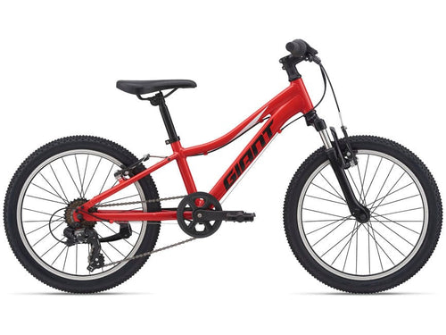A pure red Giant XTC JR 20 kids mountain bike with ALUXX-grade aluminum frame, displayed on a white background.