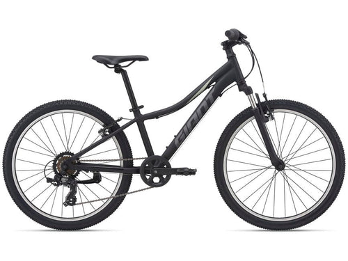 A black Giant XTC JR 24 mountain bike with a steel fork, alloy wheels, and a semi-cartridge bottom bracket.