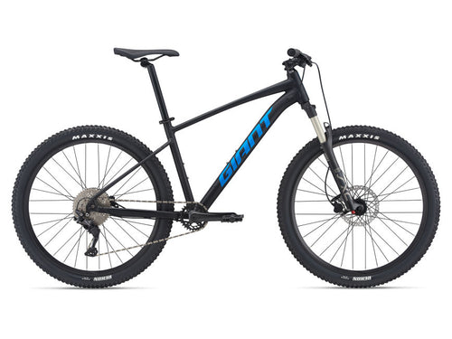 A black mountain bike with blue accents, designed for aspiring singletrack riders with stable, fast-rolling 29-inch wheels.